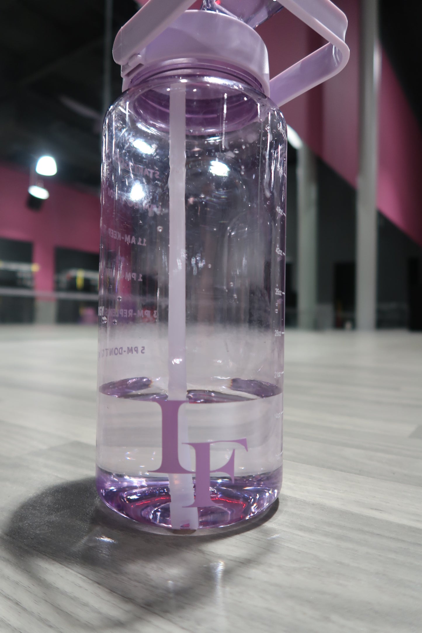Lulufit motivational water bottle 64oz.